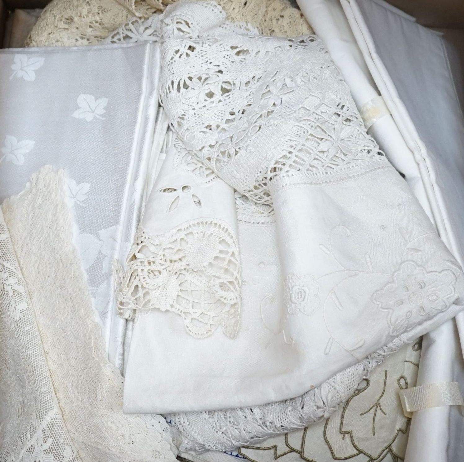 A collection of machine laces and table linens